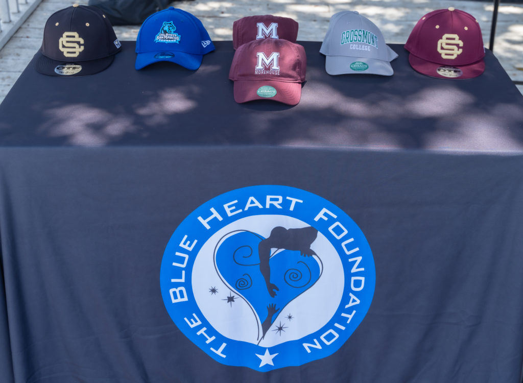 University of Southern California ball caps, Cal State - San Marcos ball cap, Morehouse ball caps, and Grossman college ball cap